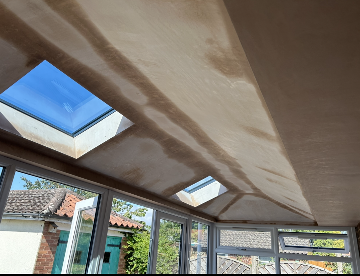 newly plastered and insulated ceiling ready to be painted